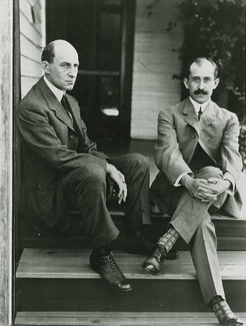 Wilbur (left) and Orville Wright on the porch of their Dayton home, June 1909